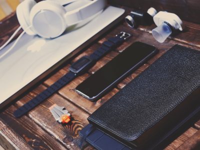 black Android smartphone on brown wooden table